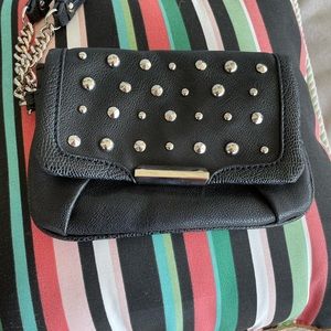 Small black clutch with silver tone studs